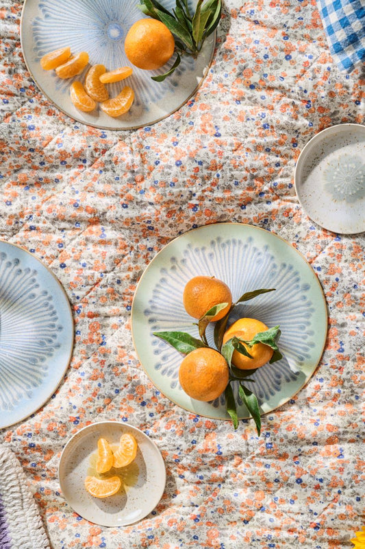 Puuvillatäkki oranssit ja siniset pikkukukat