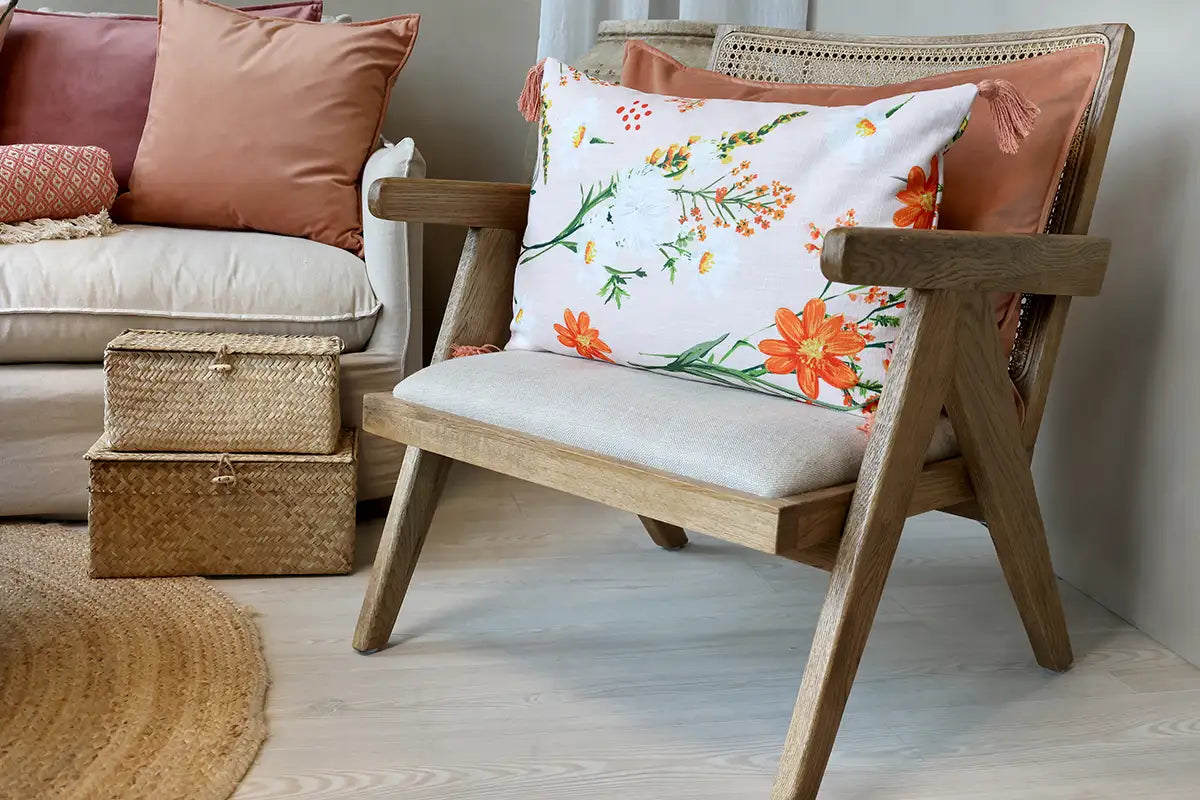 Tyynynpäällinen tupsut Kukat persikanvärisellä pohjalla 60 x 40 cm