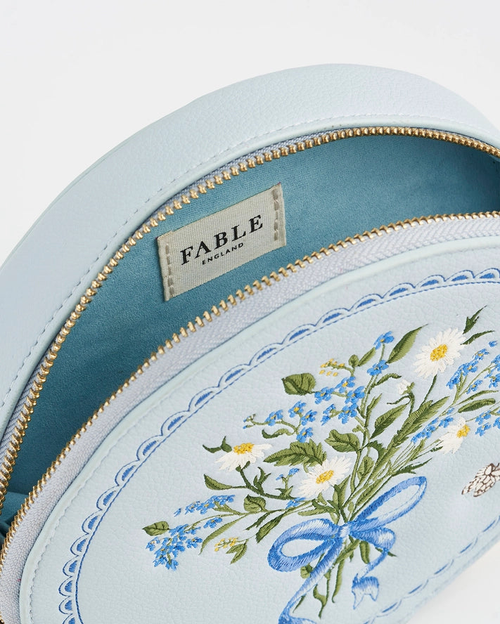 Pieni pyöreä olkalaukku Floral Bow vaaleansininen