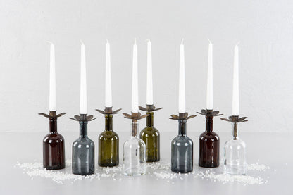 kukka kynttilänjalat pulloissa